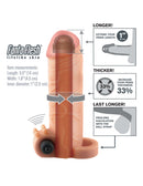 Fantasy X-Tensions Vibrating Real Feel 1-Inch Penis Extension in Flesh with size and usage benefits detailed.