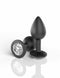 Black jeweled butt plug with diamond-like gem base for discreet pleasure and hands-free stimulation.