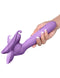 Woman holding the Fantasy For Her Vibrating Roto Suck-Her pleasure device in purple silicone.