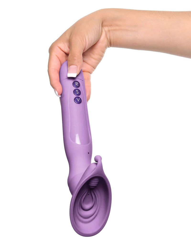 Hand holding the Fantasy For Her Vibrating Roto Suck-Her, a purple elite silicone suction toy from Pipedream Products.