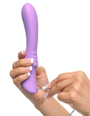 Woman holding and charging the Fantasy For Her Flexible Please Her Purple Vibrator from Pipedream Products.