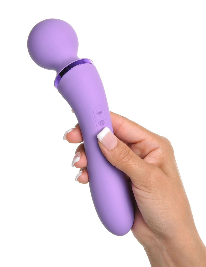 Hand holding Fantasy For Her Duo Wand Massage in purple, showcasing its smooth design and ergonomic grip for blissful pleasure.