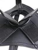 Close-up of King Cock Strap-On Harness detail, showcasing durable black straps and sturdy O-ring for secure attachment.