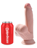 King Cock Triple Density Plus 7-inch dildo with swinging balls next to a Pipedream can for size comparison