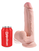 King Cock Triple Density Plus 9-inch dildo with swinging balls next to a can for size comparison