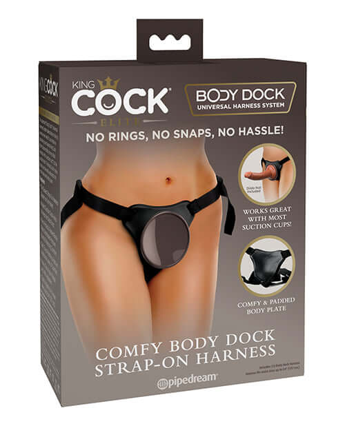 King Cock Elite Comfy Body Dock Strap-On Harness packaging showing the product features and adjustment straps.