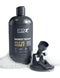 PDX Plus Shower Therapy Stroker in Brown with suction cup in soapy water, resembling a shampoo bottle for discreet pleasure.