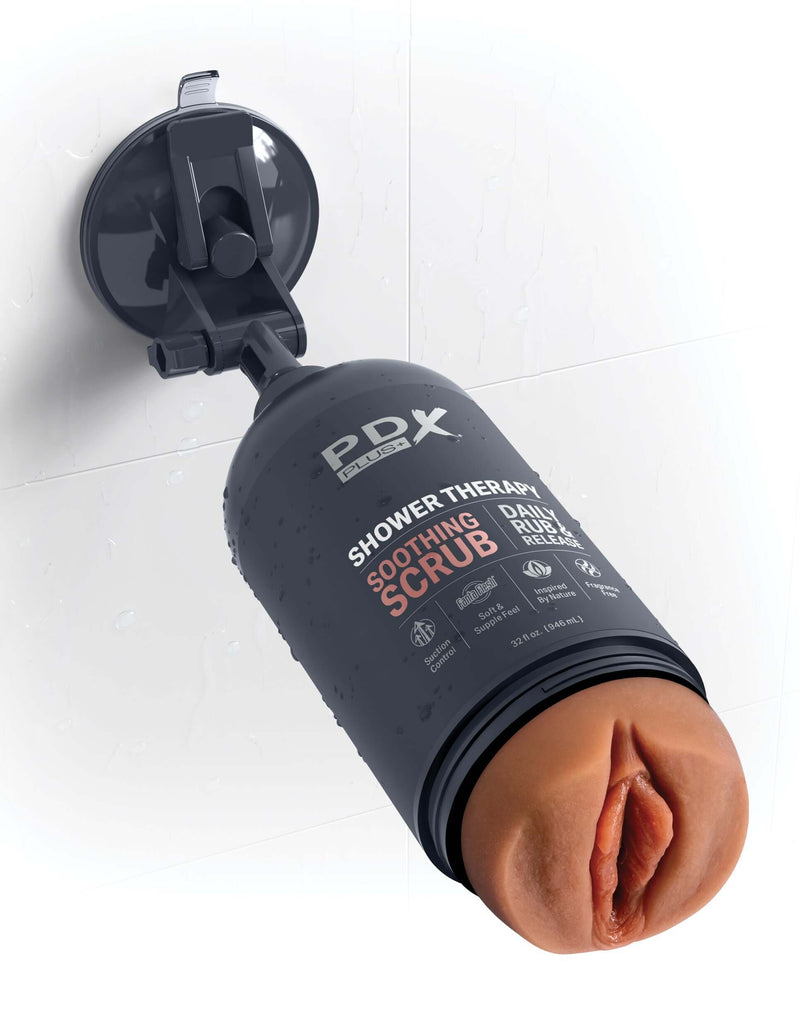 PDX Shower Therapy Soothing Scrub Stroker in Tan Skin Tone attached to shower wall, designed for discreet self-indulgence.