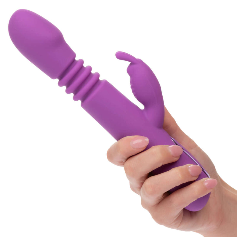 Person holding the Jack Rabbit Elite Thrusting Rabbit Vibrator with 10 vibration functions and 3 thrusting speeds