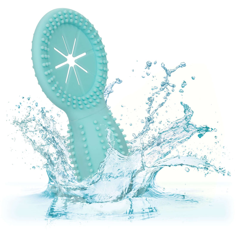 Aqua blue silicone vibrating cock ring splashing in water, showcasing waterproof design.