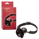 Forbidden Removable Rose Gag with adjustable ball gag and rose accent in black, packaging visible in the background.