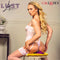 Model in lace lingerie showcasing Lust Remote Control Dual Rider Vibrator by CalExotics.