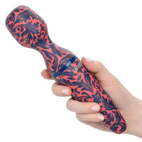 Colorful handheld massager with floral design showcasing flexibility and ergonomic grip for personalized pleasure.