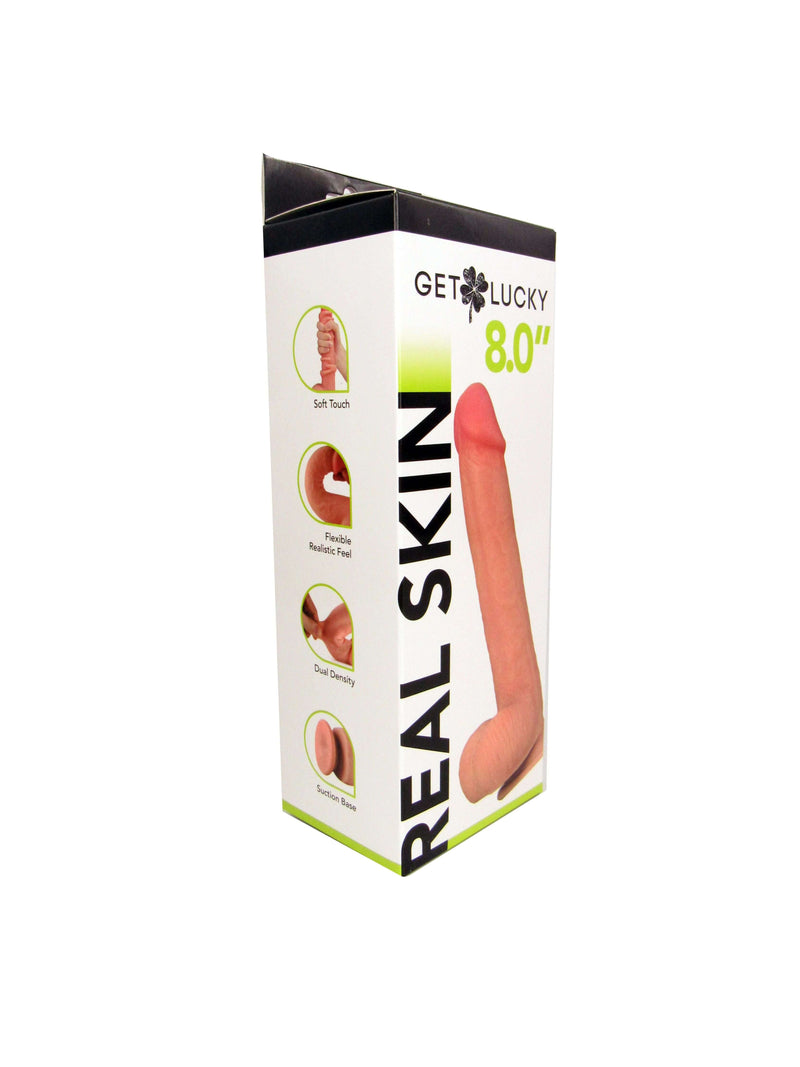 Packaging of Shibari Get Lucky 8-Inch Real Skin Dildo in Light Brown with suction cup base.