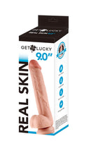 Shibari Get Lucky Real Skin 9-Inch Dildo Light Brown in retail packaging showing realistic design and body-safe material.