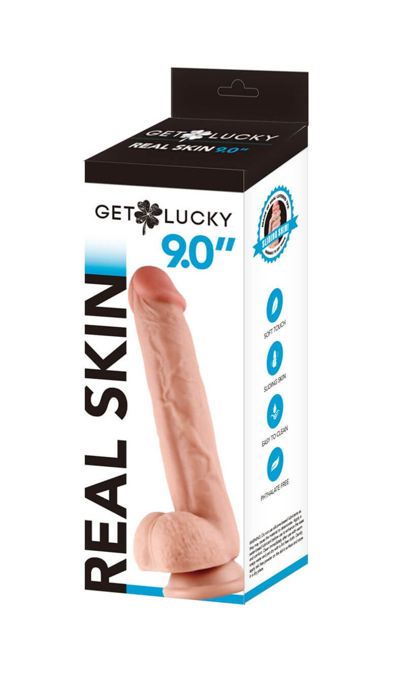 Shibari Get Lucky Real Skin 9-Inch Dildo Light Brown in retail packaging showing realistic design and body-safe material.