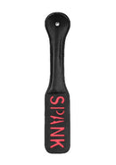 Paddle Spank Black faux leather paddle with reversed 'SPANK' imprint for impactful play. Durable and flexible design.