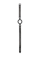 Black and white silicone ring gag with adjustable straps for BDSM play, featuring medical-grade silicone for comfort.