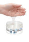 Hand applying Fist It Extra Thick Water Based Lubricant from a 300ml container