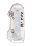 RealRock Crystal Clear Dildo with Balls in packaging, 9-inch realistic sex toy from Shots Toys, latex and phthalate free.