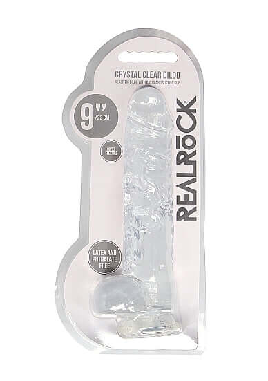 RealRock Crystal Clear Dildo with Balls in packaging, 9-inch realistic sex toy from Shots Toys, latex and phthalate free.