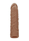 Realrock Penis Sleeve 7 inches in medium skin tone by Shots Toys, featuring detailed textures.