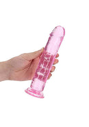 Hand holding Realrock Realistic Straight Dildo 8 Inches in pink with crystal clear design and suction cup, body-safe material.