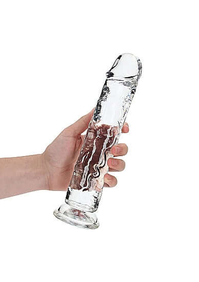 Hand holding the Realrock 11-inch realistic straight dildo with crystal clear design by Shots Toys