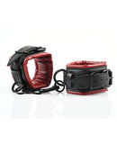 Adjustable faux leather cuffs in red and black for comfortable bondage play with swivel snap clips.