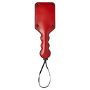 Sturdy red Sportsheets Saffron Square Paddle with a smooth vegan leather finish, perfect for sensual play and punishment.