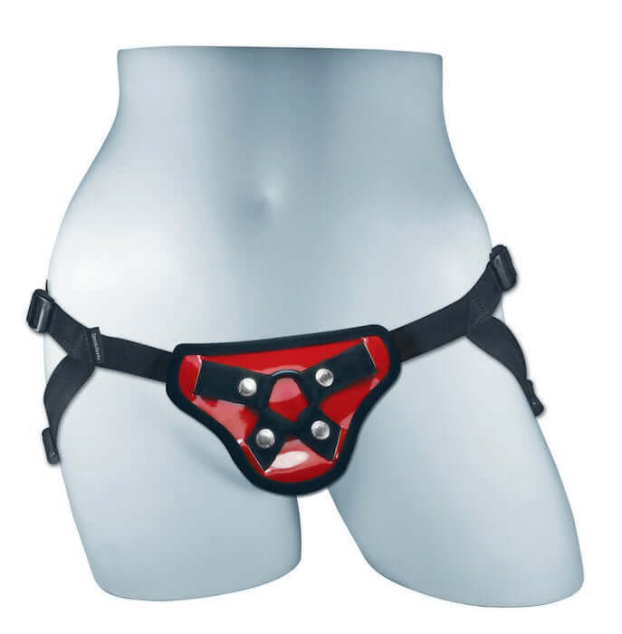 Sportsheets Entry Level Harness in red on mannequin, adjustable and comfortable for beginners, ideal for pegging.