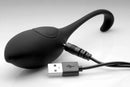 Rechargeable wireless remote control vibrating egg connected to USB for convenient charging.