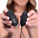 Woman holding the Under Control Vibrating Bullet and Remote Control for hands-free pleasure and thrilling sensations.