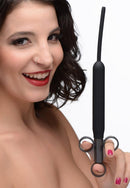 Woman smiling and holding Cleanstream Deep Shot Silicone Ribbed Lube Launcher with extended hose for precise lubrication.