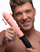 Person holding XR Brands Master Series 8X Auto Pounder Beige Dildo, showcasing its vibrating and automatic thrusting feature.
