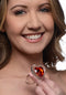 Woman smiling while holding Booty Sparks Red Heart Glass Anal Plug small size