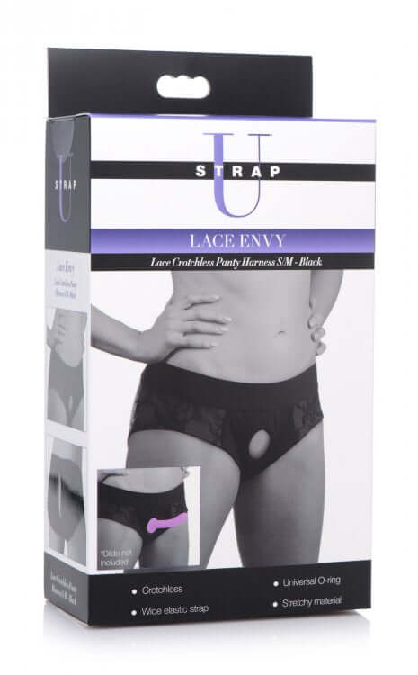 Strap U Lace Envy Crotchless Panty Harness packaging in black, featuring universal O-ring and stretch material, size S/M.