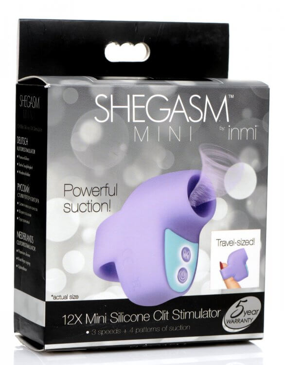 Inmi Shegasm Mini 12X Clit Stimulator in packaging showcasing its features for discreet, travel-sized pleasure.