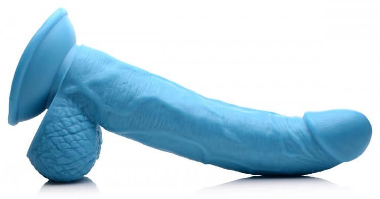 Pop 7.5 inches blue dildo with balls and suction cup base for hands-free pleasure from XR Brands. Veiny shaft and realistic design.