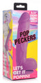 Pop Peckers 8.25-Inch Purple Dildo with Balls in packaging with colorful design and suction cup base