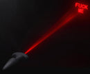 "Booty Sparks anal plug projecting red laser light 'Fuck Me' in dark background"