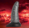 Creature Cocks Beastly Tapered Bumpy Silicone Dildo with tentacle-like design and suction cup base against a fiery background