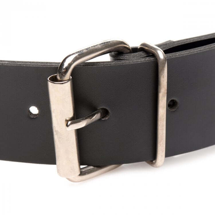 Close-up of Master Series Strap and Ride Dildo Strap Harness buckle and black leather strap from XR Brands.