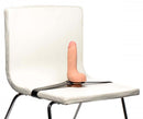 Master Series Strap and Ride Dildo Strap Harness attached to a chair, showcasing versatile positioning options.