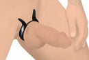 Vibrating dual motor cock ring on male model with viper prongs for dual stimulation.