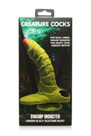 Swamp Monster Silicone Dildo by Creature Cocks in packaging with scaly texture and green color.