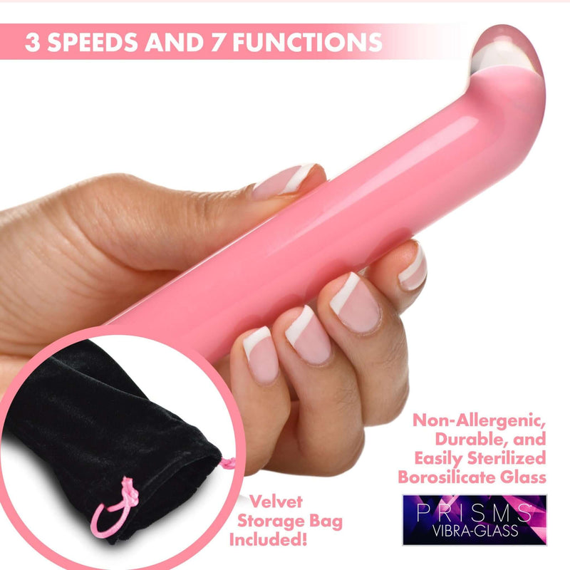 Prisms Vibra Glass 10X Pink G-Spot Vibrator held in hand with 3 speeds, 7 functions, and velvet storage bag from XR Brands