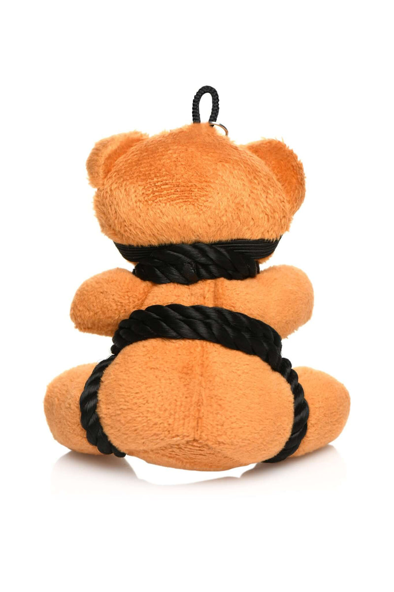 Cute bondage bear keychain wrapped in silky black rope, a playful gift for desk or backpack.