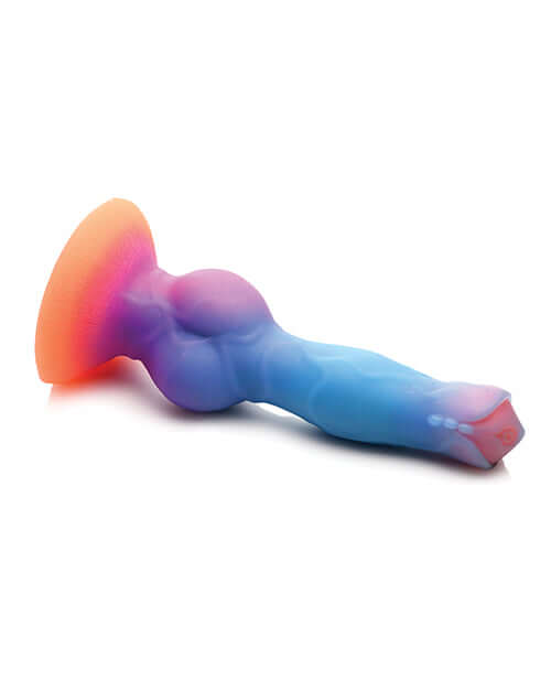 Glow-in-the-dark silicone dildo in vibrant colors from Creative Cocks, featuring a bulging knot and textured shaft for an out-of-this-world experience.