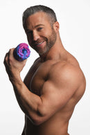 Man holding Creature Cocks Cyclone Squishy Alien Vagina Stroker by XR Brands